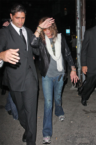 Illustration for article titled Jennifer & John Tread Water; Johnny Depp Flies Fancy